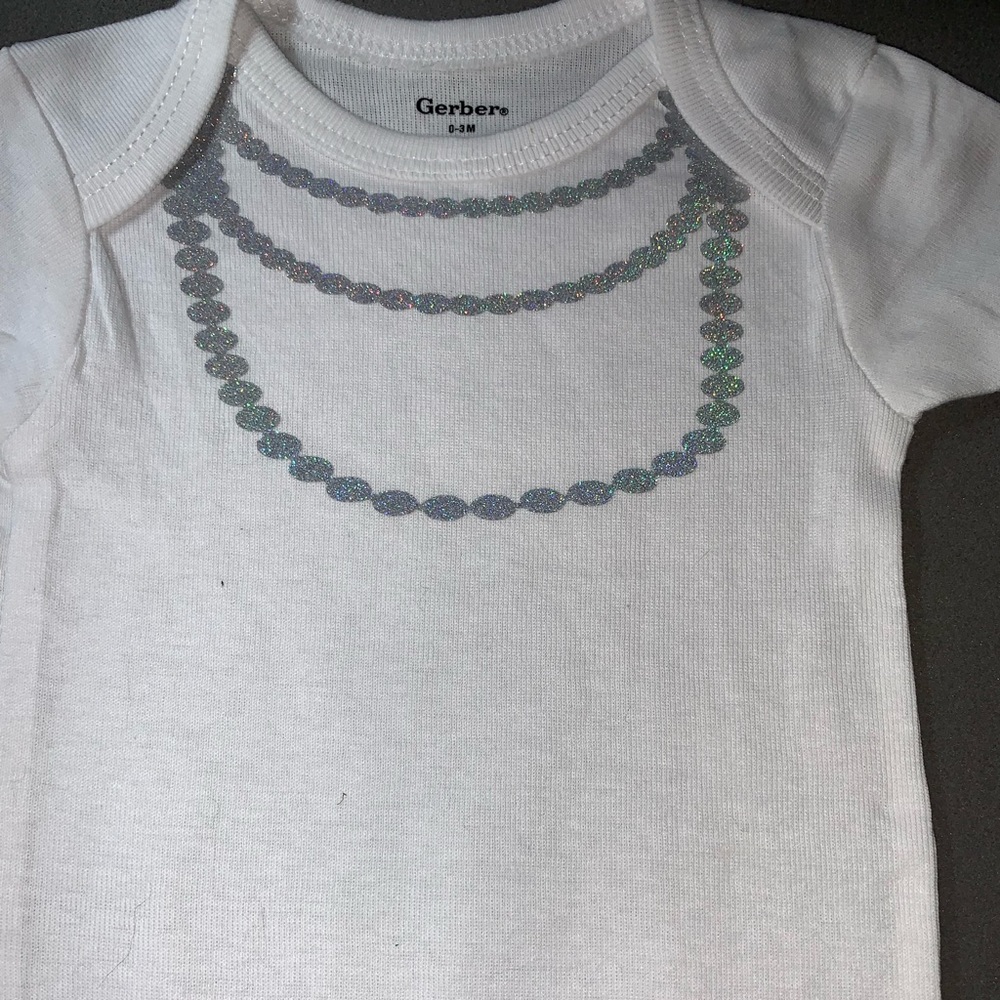 Onesie with glitter necklace
